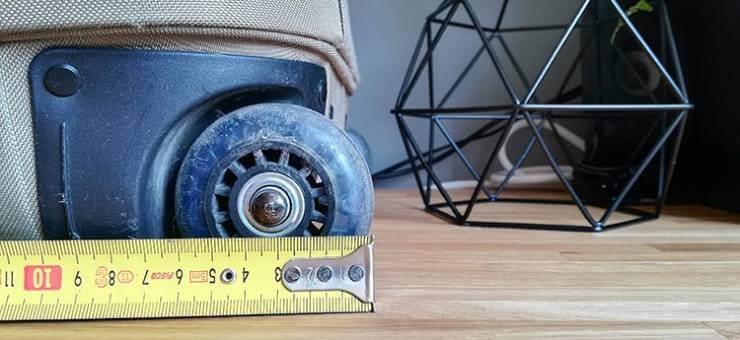 measuring luggage wheel