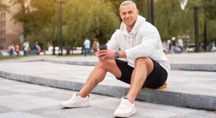 hoodie with chino shorts and white sneakers - summer style